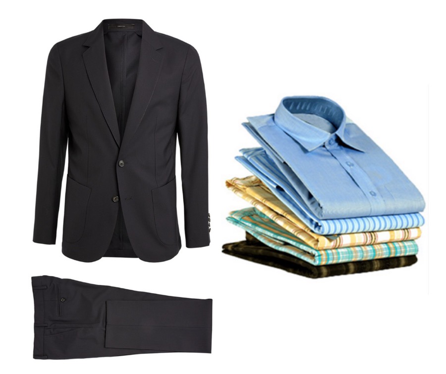 A pressed suit beside a stack of folded shirts